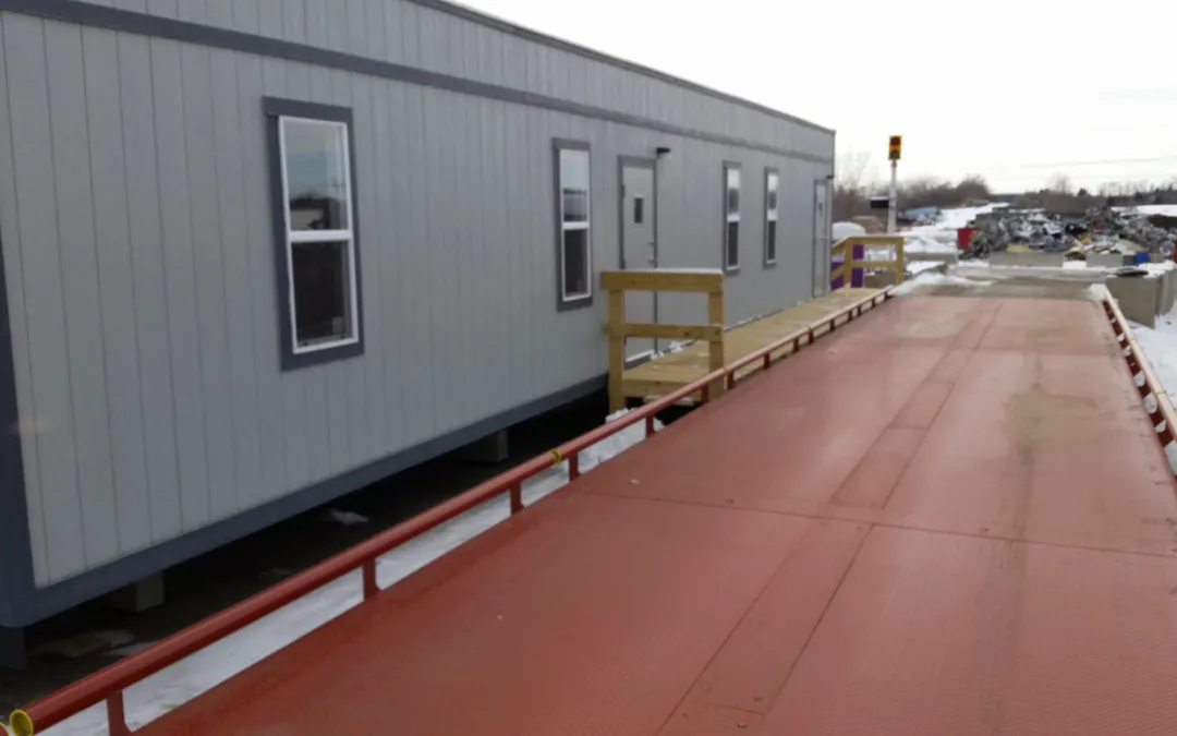 Scale house and truck scale at the Falcon Green Resources transfer station in Woodstock, IL