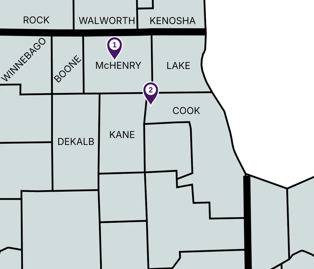 Map of northern Illinois and southern Wisconsin counties with the Falcon Green Resources locations: pin 1 Woodstock in McHenry County, pin 2 Hoffman Estates in Cook County